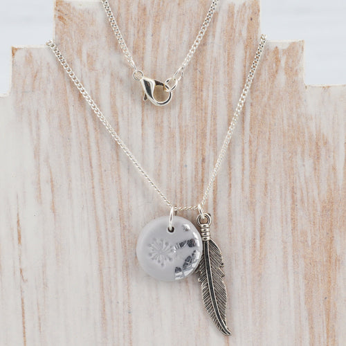 Grey and silver charm necklace