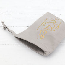 Load image into Gallery viewer, Cotton crystal pouch with a gold geometric vinyl detail